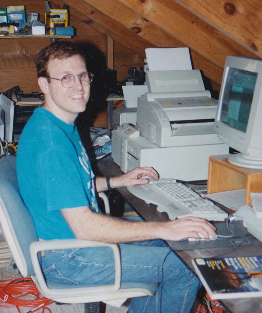 Water.org co-founder Gary White sitting at his computer in the early days of Water.org's inception.