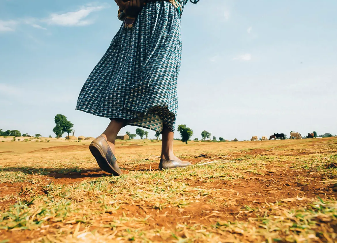 A woman in Ethiopia walks to get water