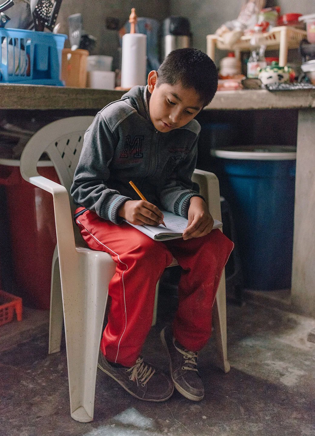 Paulo does homework in Lima, Peru